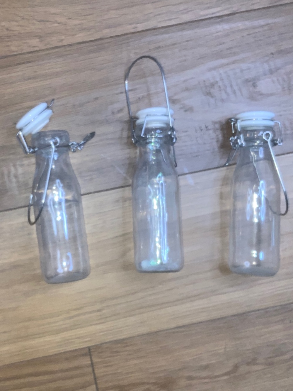 Three Mini Glass Milk Bottles with Tops